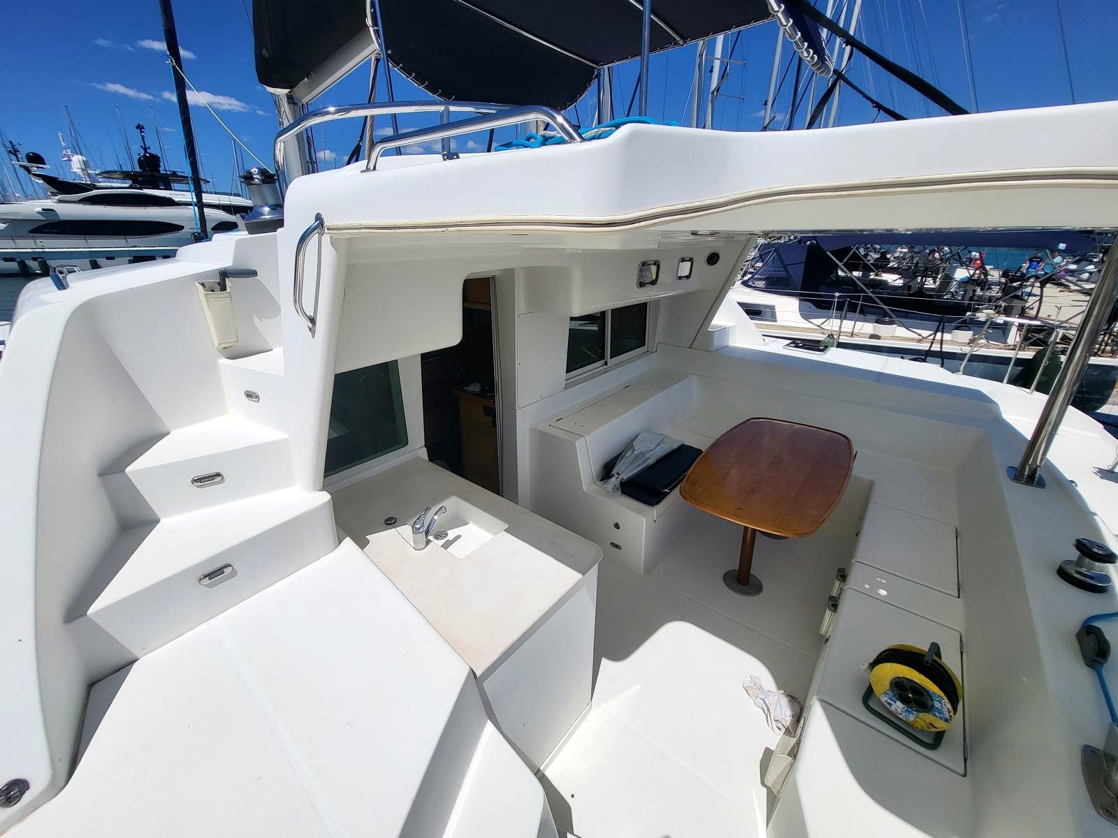 Cockpit dining table and galley on Chardonnay