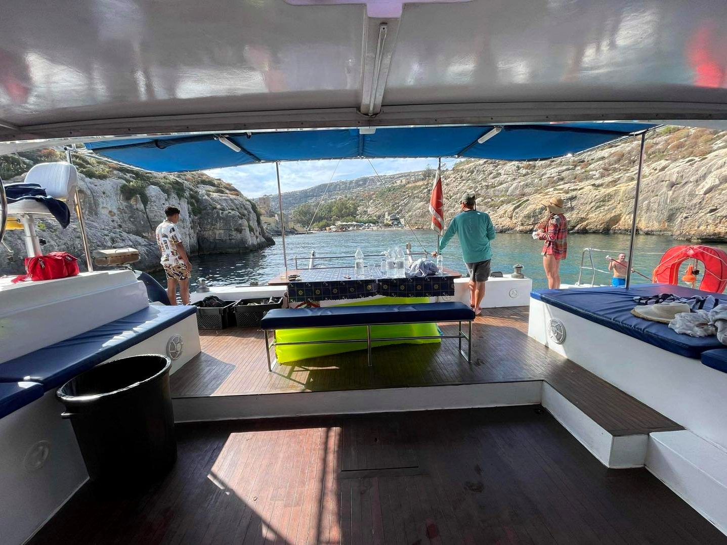 Shaded cockpit lounge with cushioned seating on La Zingara